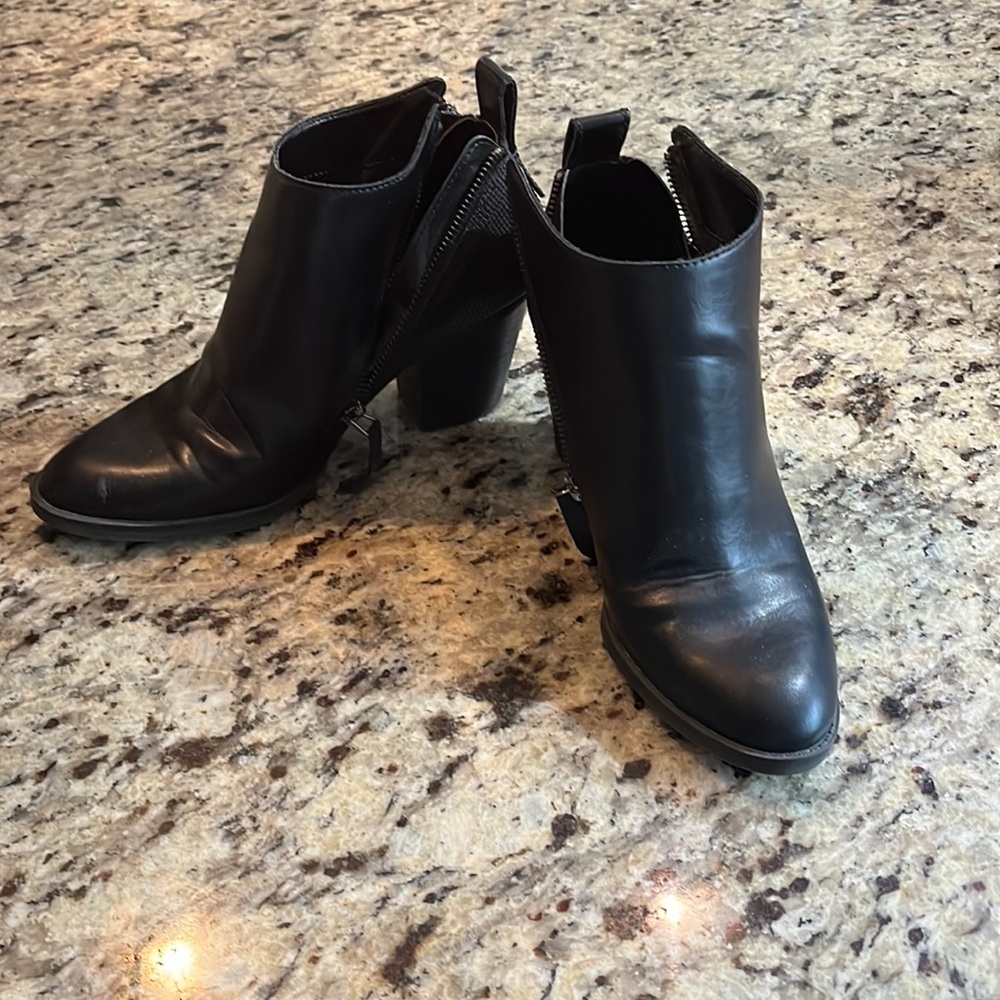 Black zippered boots